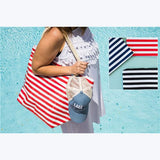 STRIPED WATERPROOF BEACH TOTE & WRISTLET